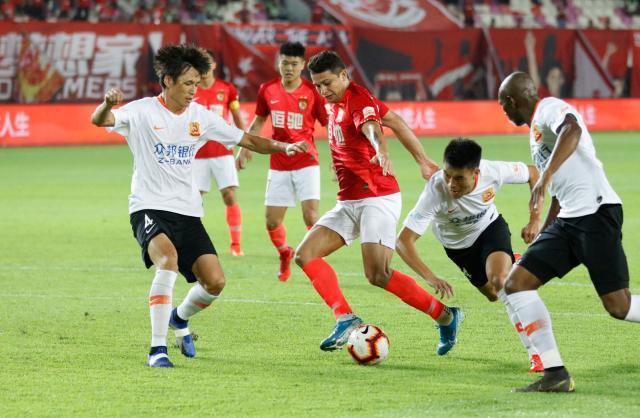 欧冠让球盘口-沪媒：足协或修改中超赛程 等待国脚归队顺延一周